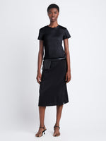 Front image of model wearing Maren Top in Eco Cotton Jersey in black