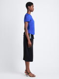 Side full length image of model wearing Maren Top In Eco Cotton Jersey in COBALT