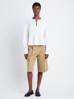 Front full length image of model wearing Monica Top In Compact Poplin in WHITE