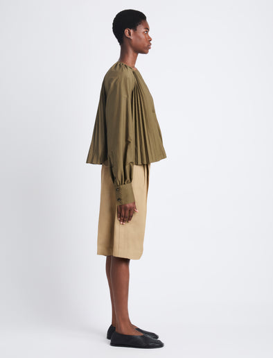Side full length image of model wearing Monica Top In Compact Poplin in WOOD