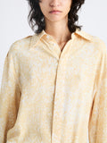 Detail image of model wearing Norman Top In Printed Viscose Crepe in YELLOW MULTI