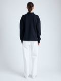 Back full length image of model wearing Brooks Polo in Cotton Terry Jersey in BLACK