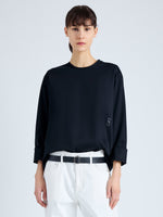Front cropped image of model wearing Olson T-Shirt in Eco Cotton Jersey in BLACK