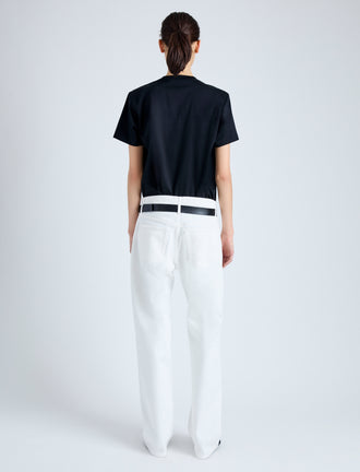 Back full length image of model wearing Kira T-Shirt in Eco Cotton Jersey in BLACK