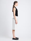 Side full length image of model wearing Jenny Short In Cotton Linen in ECRU