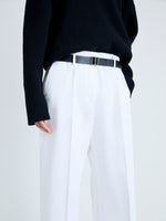 Detail image of model wearing Amara Pant in Organic Cotton Twill Suiting in OFF WHITE