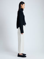 Side full length image of model wearing Amara Pant in Organic Cotton Twill Suiting in WHEAT