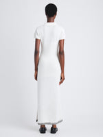 Back full length image of model wearing Auden Dress In Textured Knit in WHITE