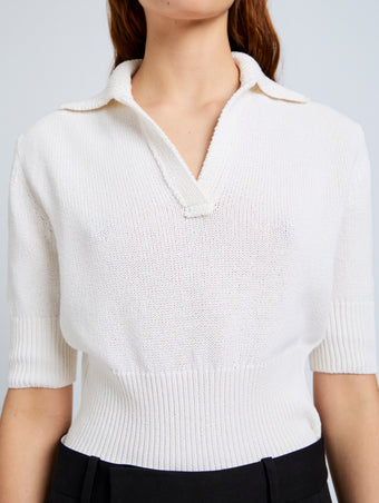 Proenza Schouler Detail image of model wearing Reeve Polo in Cotton Knit in Off White