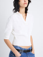 Detail image of model wearing Reeve Polo In Cotton in OFF WHITE