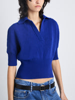 Detail image of model wearing Reeve Polo In Cotton in COBALT