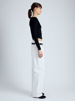 Side full length image of model wearing Addie Cardigan in Silk Viscose in BLACK