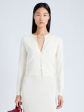 Front cropped image of model wearing Addie Cardigan in Silk Viscose in IVORY