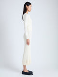 Side full length image of model wearing Addie Cardigan in Silk Viscose in IVORY