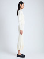 Side full length image of model wearing Addie Cardigan in Silk Viscose in IVORY