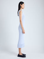 Side image of model wearing Tatum Knit Dress in Silk Viscose in SKY BLUE