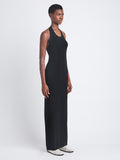 Side full length image of model wearing Meryl Dress In Matte Viscose Crepe Knit in BLACK