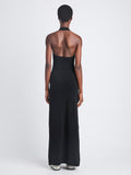 Back full length image of model wearing Meryl Dress In Matte Viscose Crepe Knit in BLACK