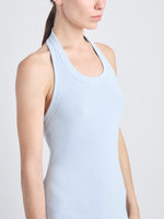 Detail image of model wearing Meryl Dress In Matte Viscose Crepe Knit in LIGHT BLUE