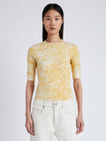 Cropped front image of model wearing Greta Top In Knit Jacquard in YELLOW MULTI