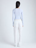 Back image of model wearing Boyd Henley in Silk Viscose in sky blue