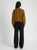 Back image of model wearing Sofia Cardigan In Cotton in OCHRE