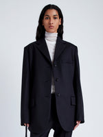 Proenza Schouler Front cropped image of model wearing Archer Jacket in Wool Twill Suiting in BLACK