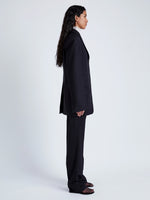 Proenza Schouler Side full length image of model wearing Archer Jacket in Wool Twill Suiting in BLACK