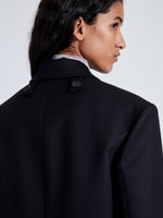 Proenza Schouler Detail image of model wearing Archer Jacket in Wool Twill Suiting in BLACK