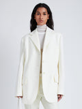 Proenza Schouler Front cropped image of model wearing Archer Jacket in Wool Twill Suiting in WAX