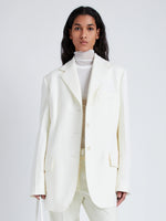 Proenza Schouler Front cropped image of model wearing Archer Jacket in Wool Twill Suiting in WAX