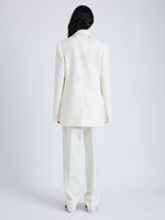 Proenza Schouler Back full length image of model wearing Archer Jacket in Wool Twill Suiting in WAX