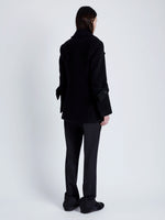 Proenza Schouler Back full length image of model wearing Rowen Coat in Eco Double Face Wool in BLACK