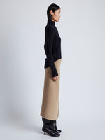 Proenza Schouler Side image of model wearing Aida Skirt in Brushed Melange Wool in CAMEL MELANGE