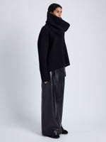 Side full length image of model wearing Adriana Skirt In Nappa in Black