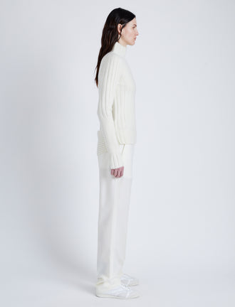 Proenza Schouler Side full length image of model wearing Haven Sweater in Midweight Cashmere Rib in BONE