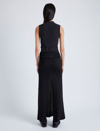 Proenza Schouler Back full length image of model wearing Avalon Skirt in Lacqured Viscose in BLACK