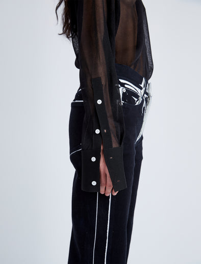 Detail image of model wearing Ryman Jean in black multi