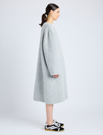 Proenza Schouler Side full length image of model wearing Albers Coat in Textured Double Face Wool in LIGHT GREY MULTI
