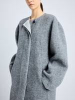 Proenza Schouler Detail image of model wearing Albers Coat in Textured Double Face Wool in DARK GREY MULTI