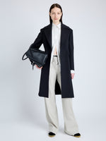 Proenza Schouler Front full length image of model wearing Thea Coat in Wool Gabardine Suiting in BLACK