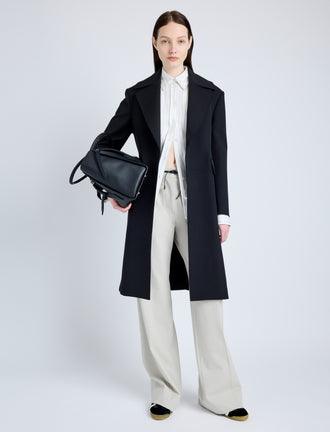 Proenza Schouler Front full length image of model wearing Thea Coat in Wool Gabardine Suiting in BLACK