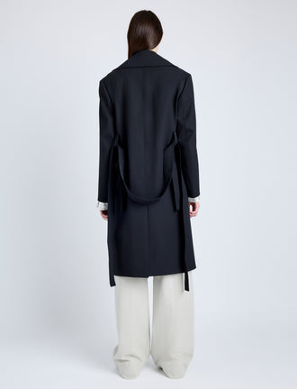 Proenza Schouler Back full length image of model wearing Thea Coat in Wool Gabardine Suiting in BLACK