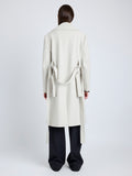 Proenza Schouler Back full length image of model wearing Thea Coat in Wool Gabardine Suiting in TAUPE