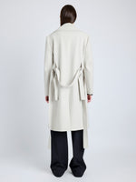 Proenza Schouler Back full length image of model wearing Thea Coat in Wool Gabardine Suiting in TAUPE
