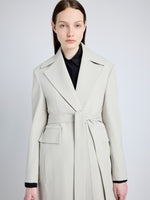 Proenza Schouler Detail image of model wearing Thea Coat in Wool Gabardine Suiting in TAUPE