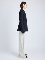 Proenza Schouler Side full length image of model wearing Lark Blazer in Wool Gabardine Suiting in BLACK