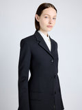 Proenza Schouler Detail image of model wearing Lark Blazer in Wool Gabardine Suiting in BLACK