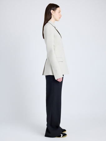 Proenza Schouler Side full length image of model wearing Lark Blazer in Wool Gabardine Suiting in TAUPE