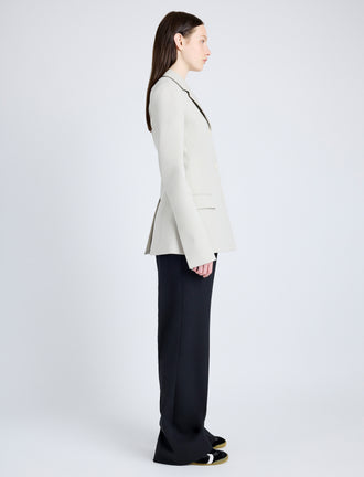 Proenza Schouler Side full length image of model wearing Lark Blazer in Wool Gabardine Suiting in TAUPE